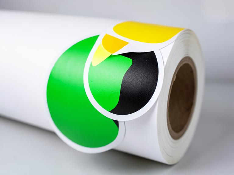 Roll of custom-cut vinyl stickers